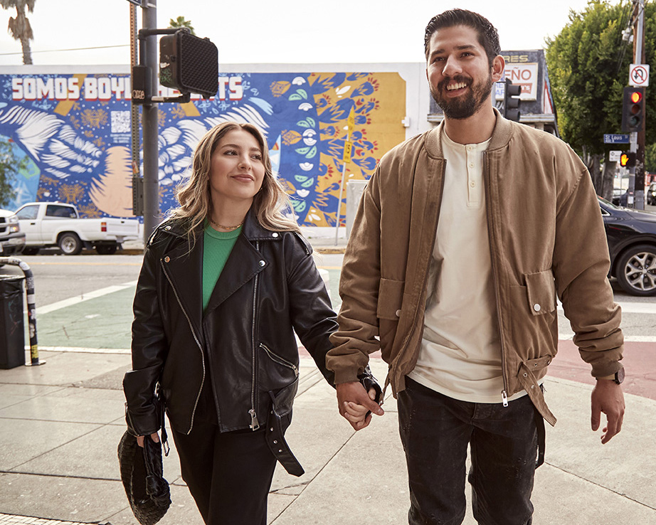 couple walking and holding hands